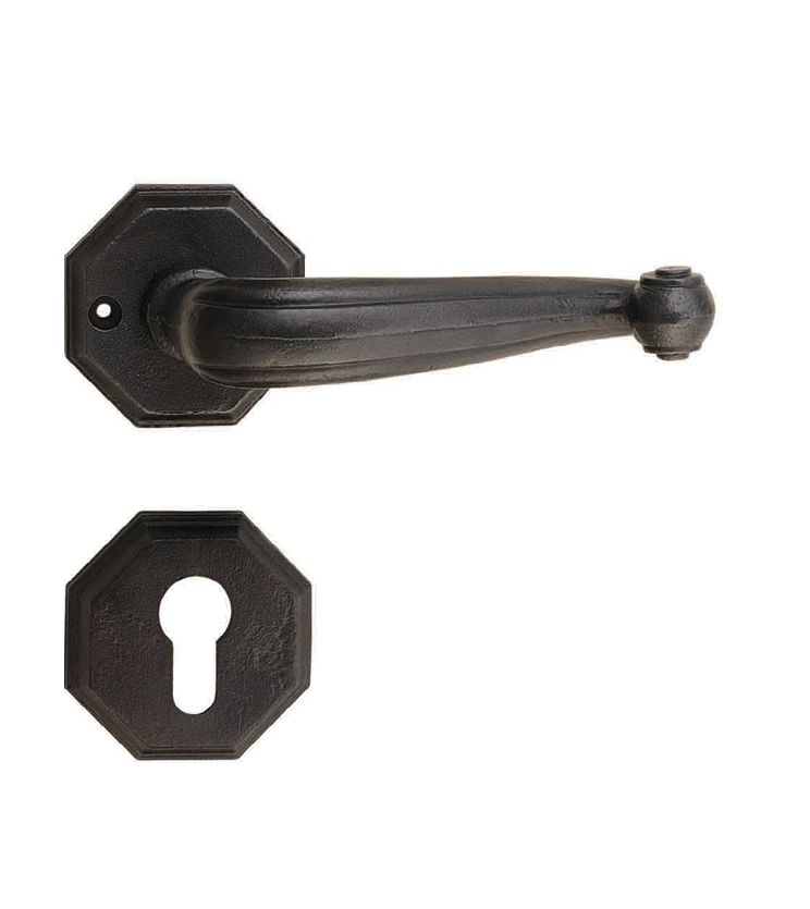 Vintage mortise door handle and lock on rosette for villa