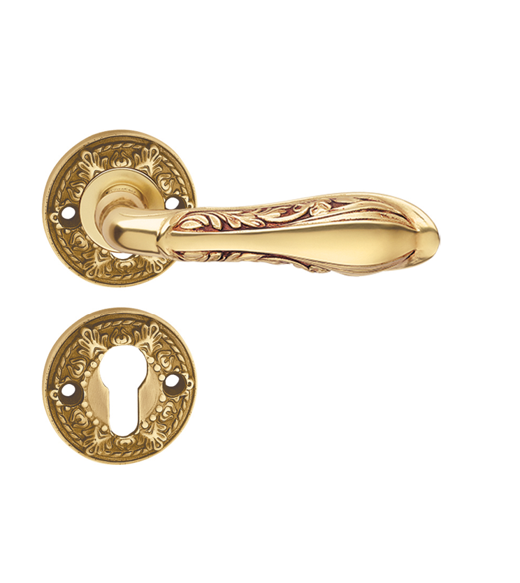 Vintage mortise door handle and lock on rosette for hotels